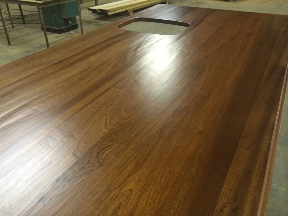 Custom sapele wood countertop with hand hewn texture