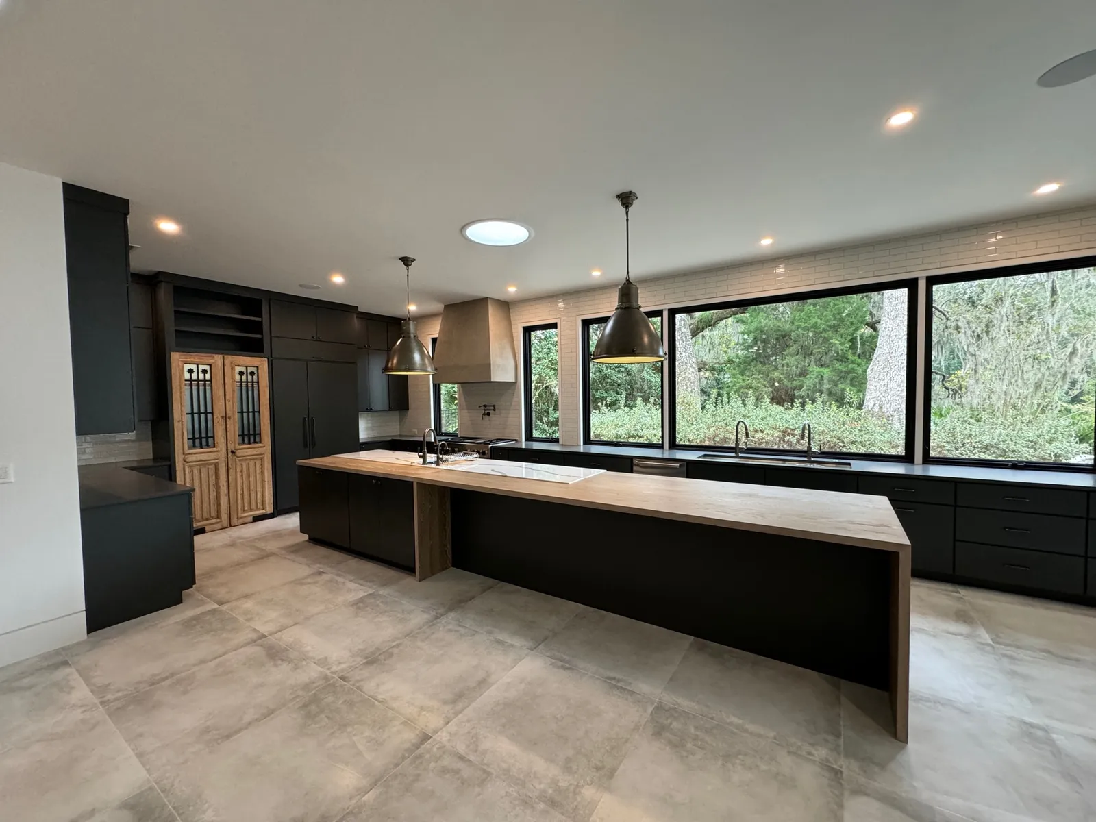 Our Charu finish on plank style white oak kitchen island countertop