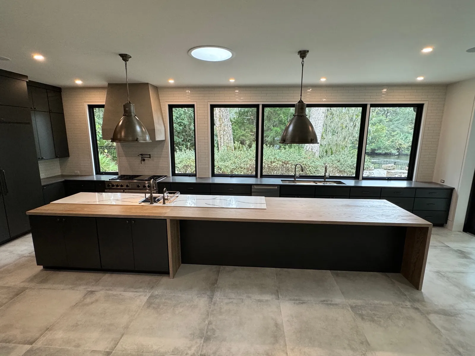 Our Charu finish on plank style white oak kitchen island countertop