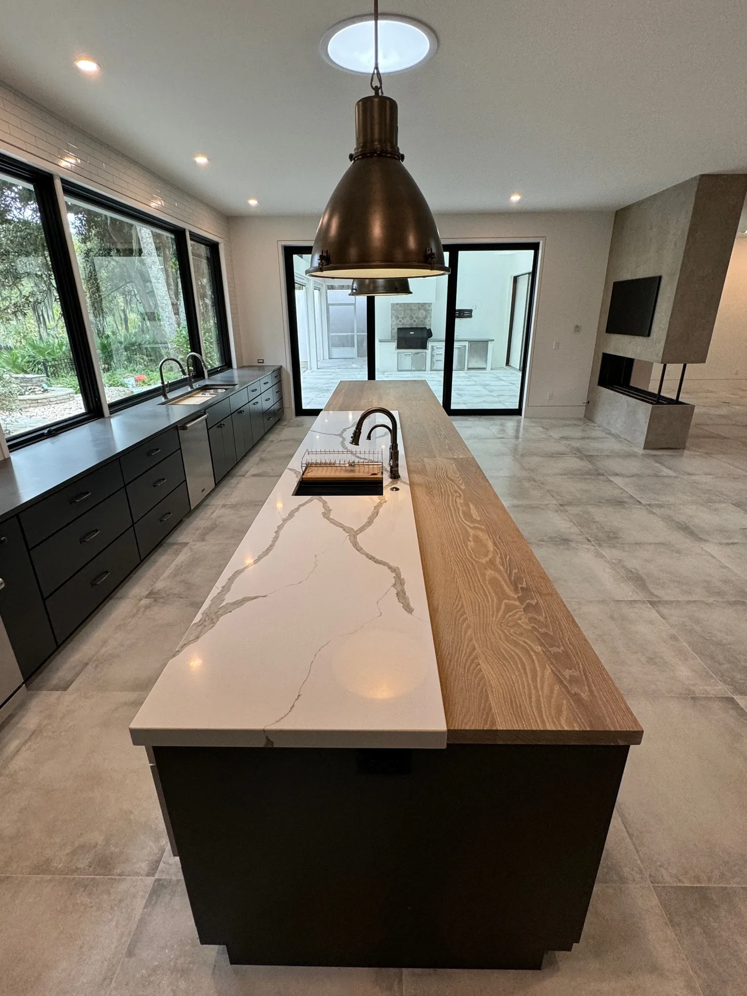 Our Charu finish on plank style white oak kitchen island countertop