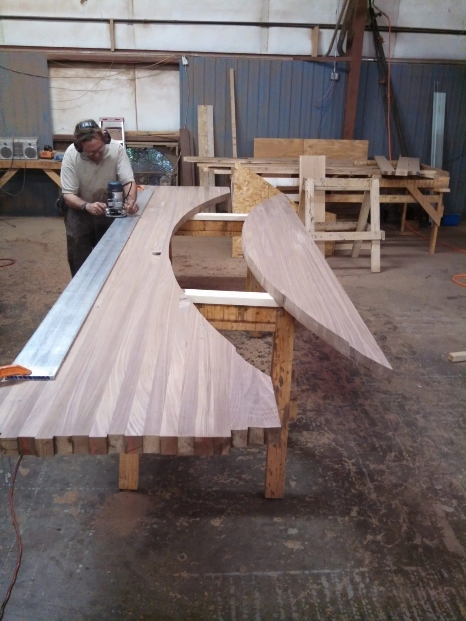 Wood bar top being cut to size