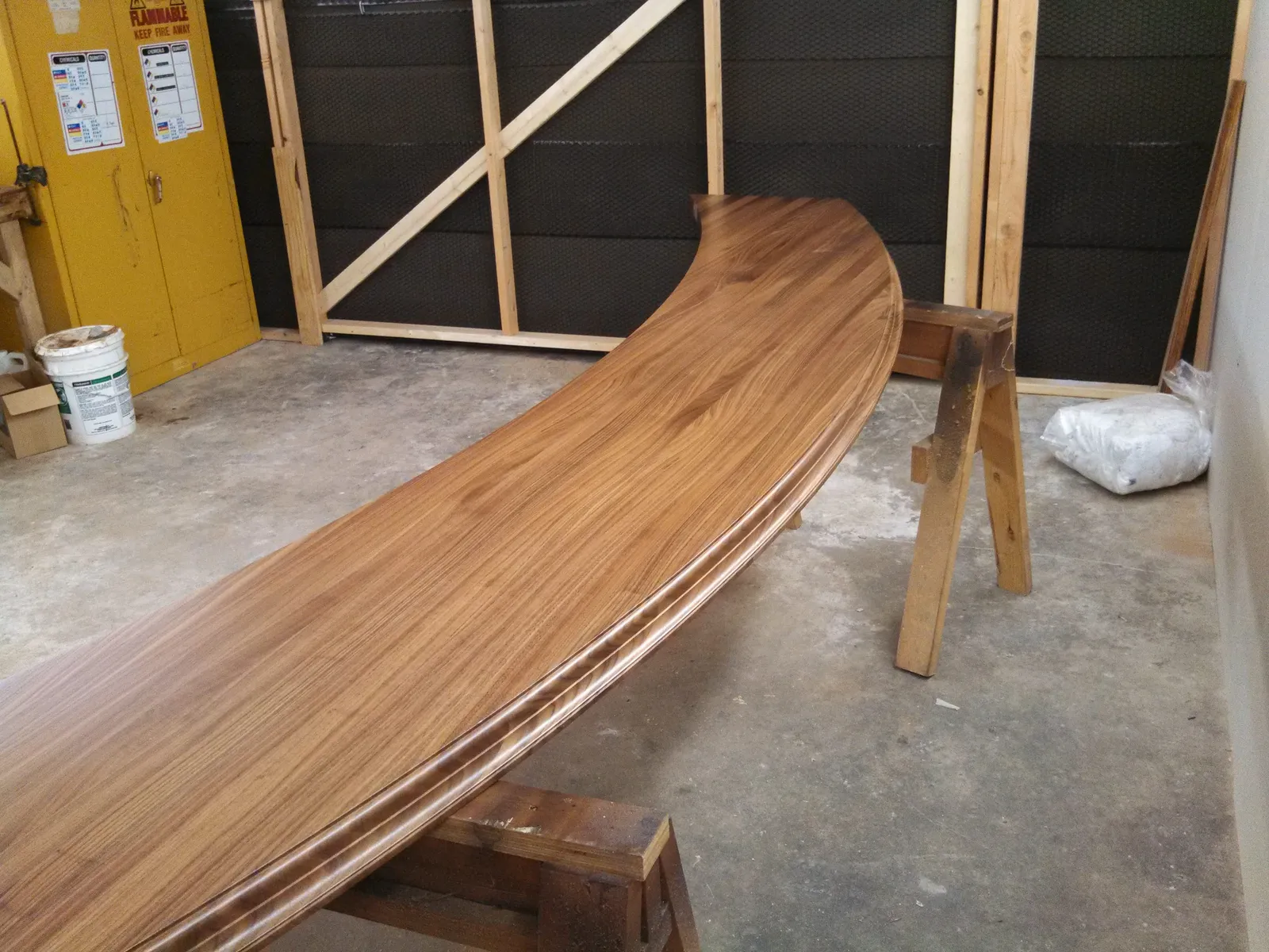 Wood bar top is finished but needs final sanding.