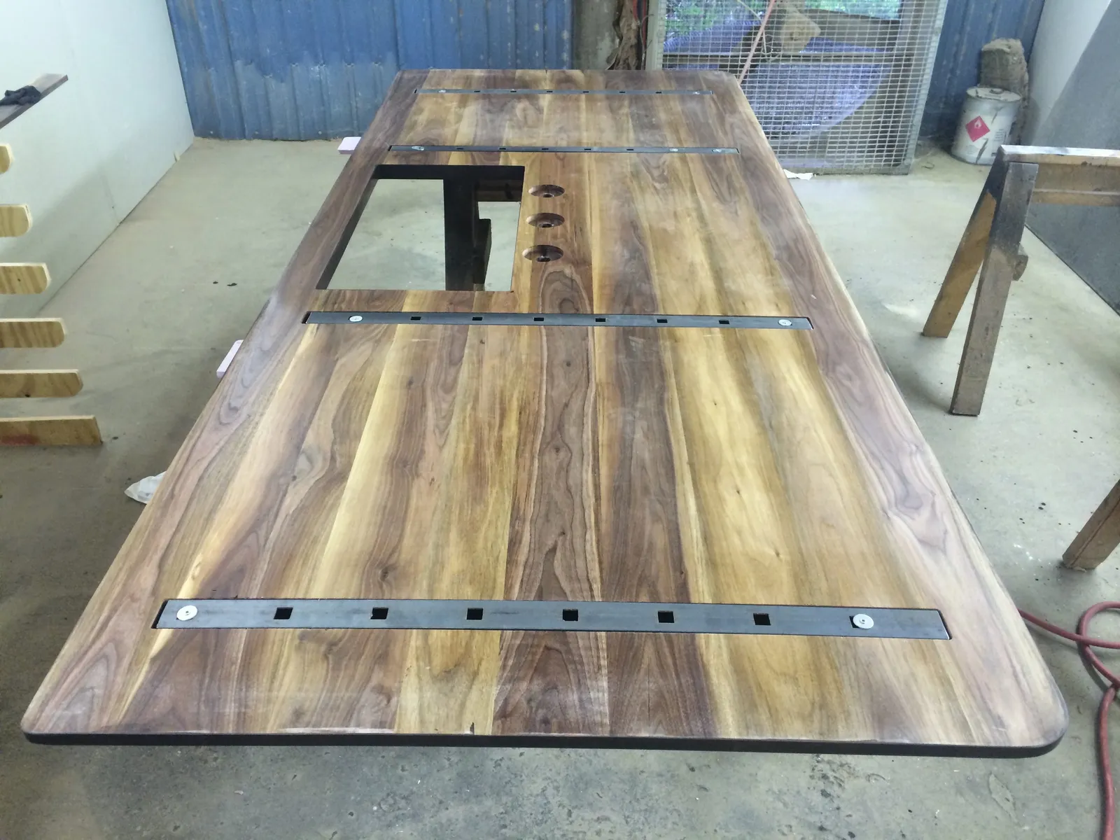 Wood countertop with hidden steel support bars.