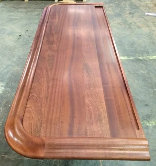 Long cut out across the rear edge and the rim created by the Chicago Bar Rail give this top an authentic feel and function.