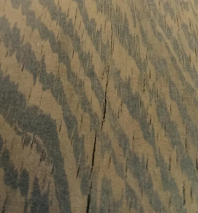 Check in a wooden counter made from wenge.