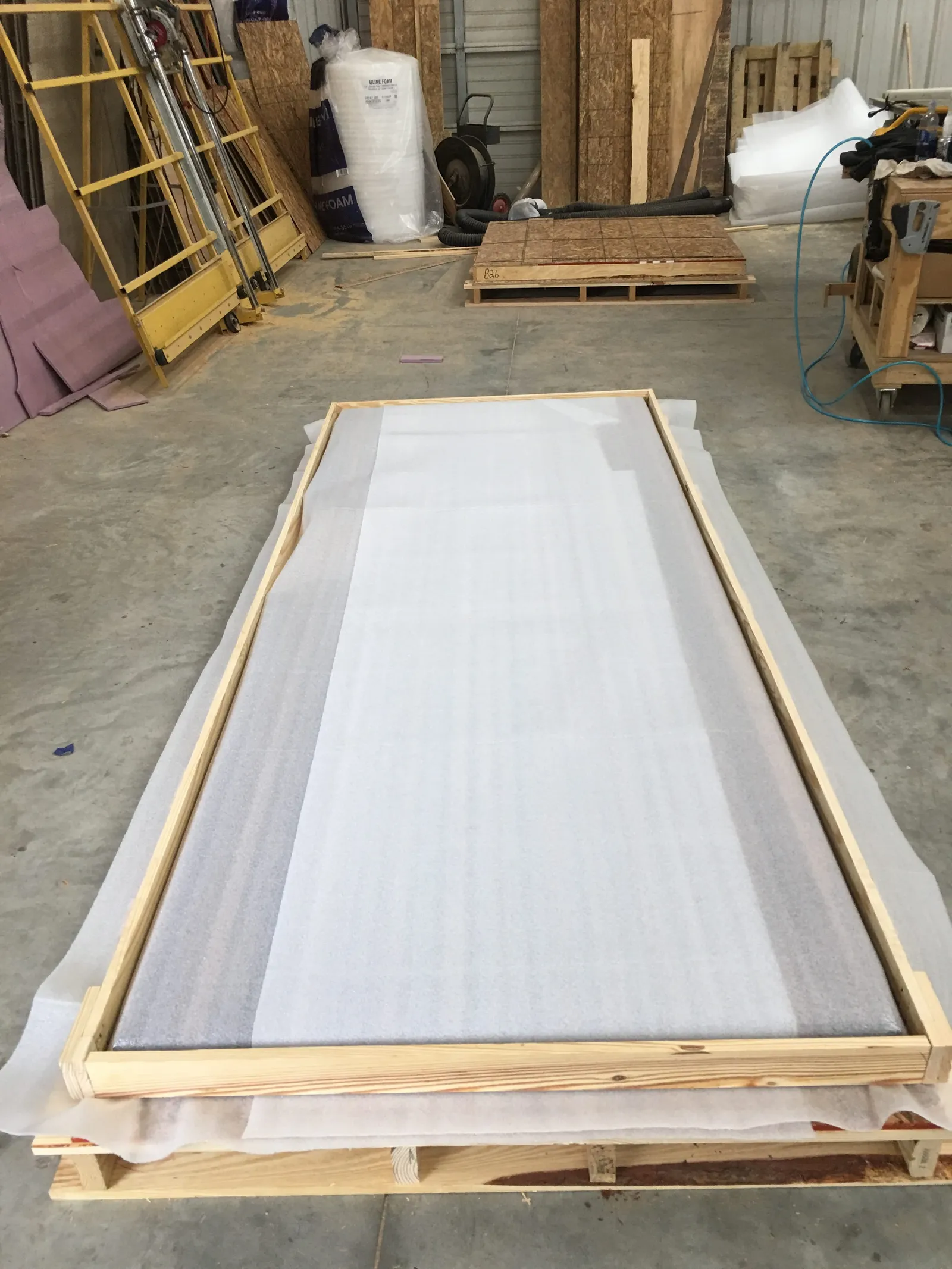 The wood countertop is packaged and protected for its trip