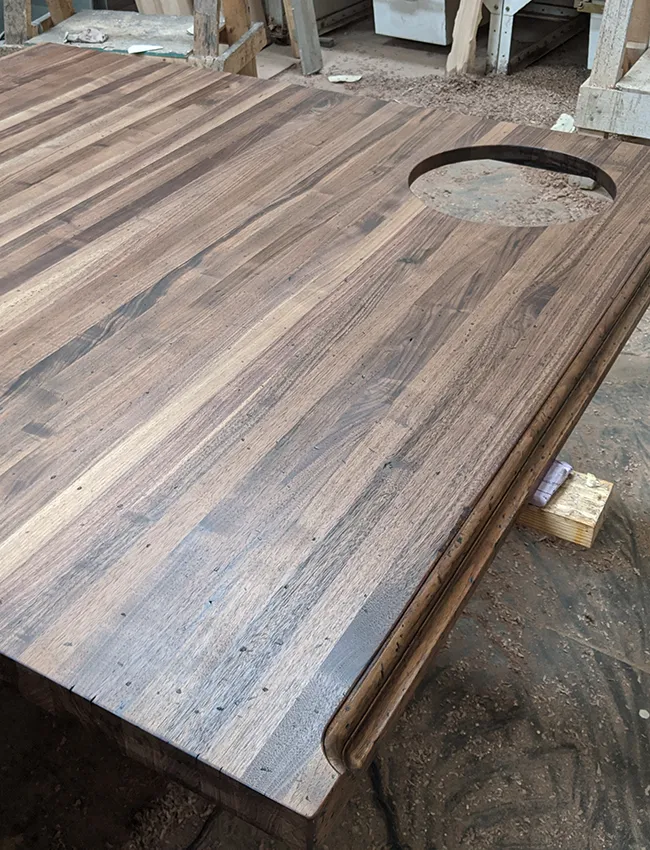 Custom walnut butcher block kitchen island top.