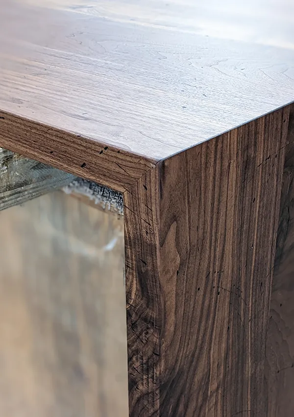 Walnut kitchen island with waterfall end
