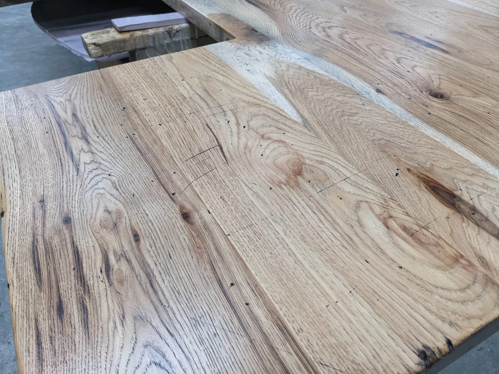 Close-up of a hand scraped, distressed oak countertop surface