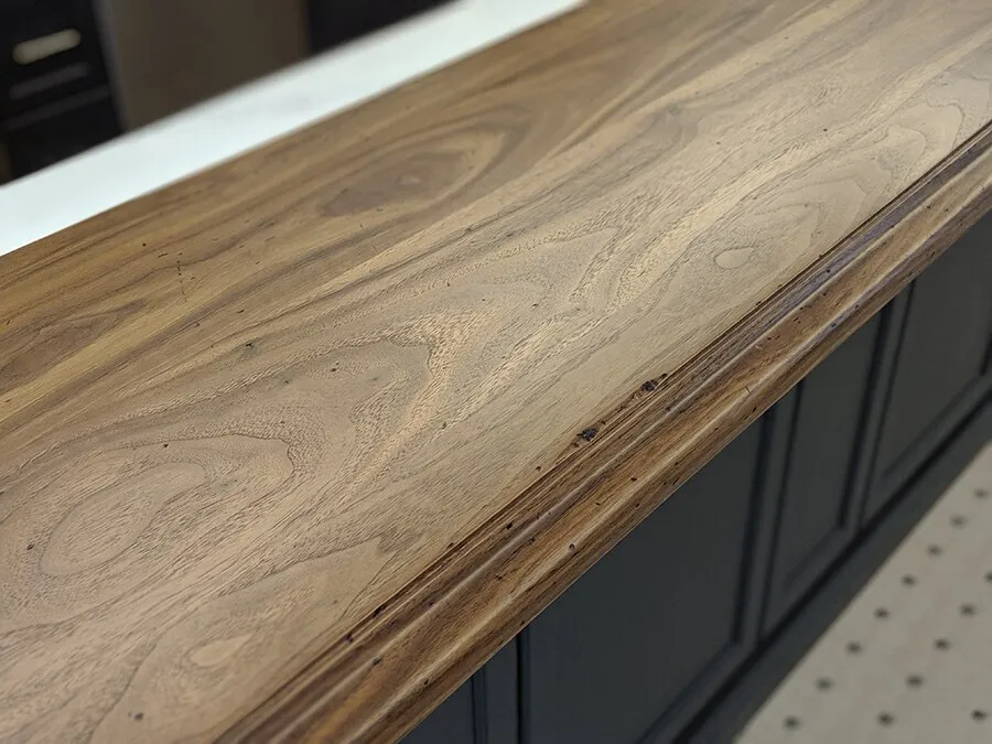Hand scraped walnut countertop with a distressed profiled edge