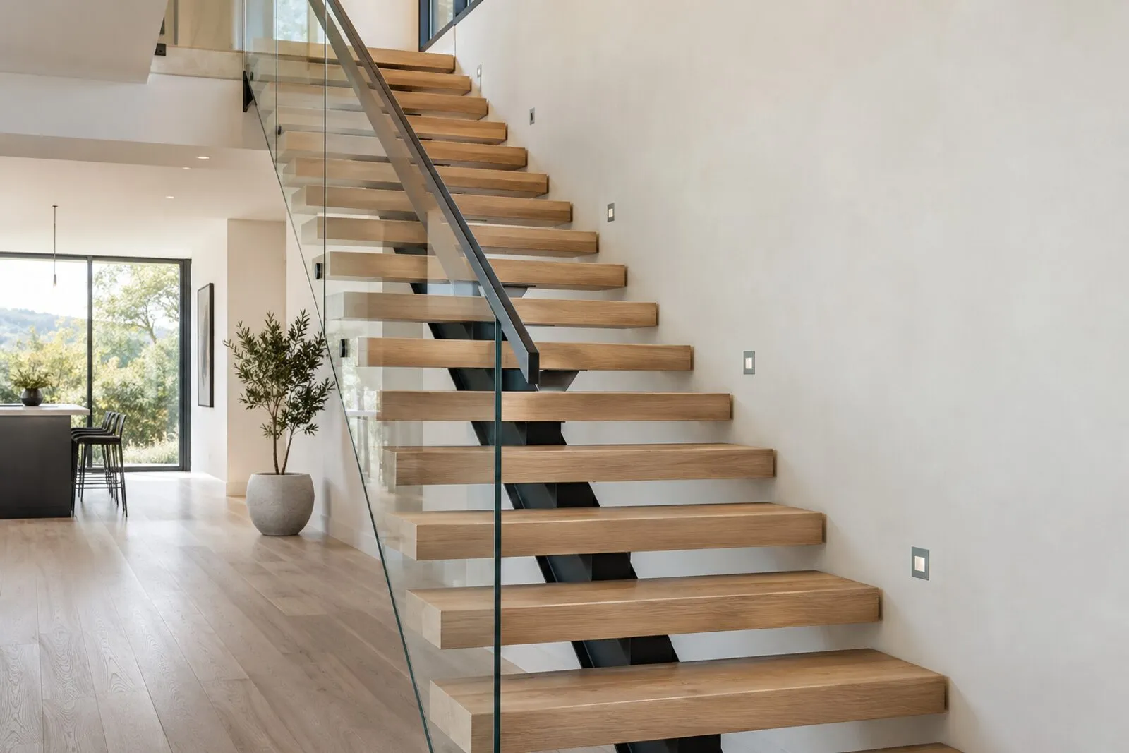 Solid wood stair treads on a finished staircase